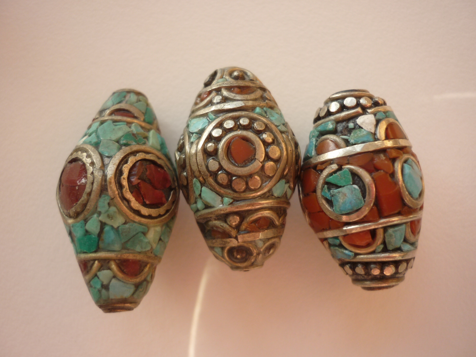 Medium ornate red coral and turquoise beads