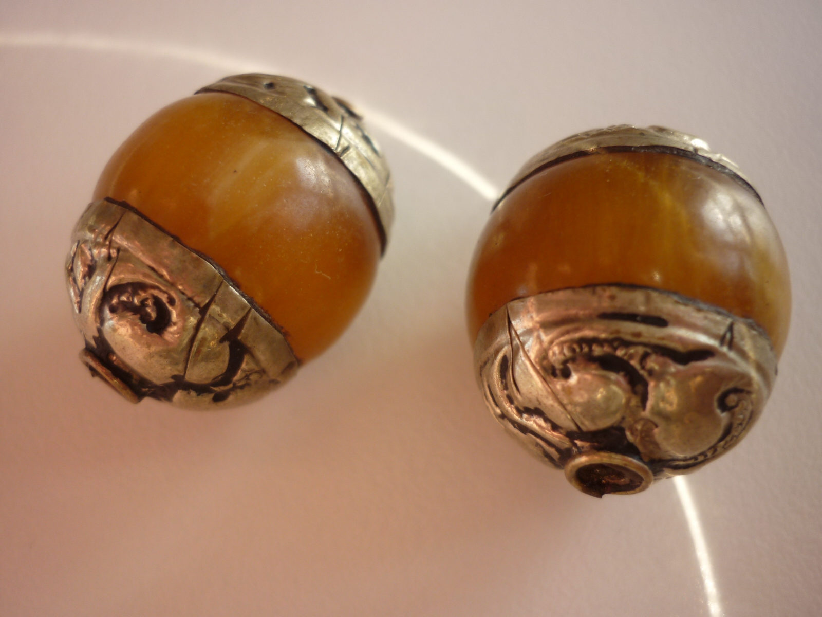 Large amber and stainless steel beads